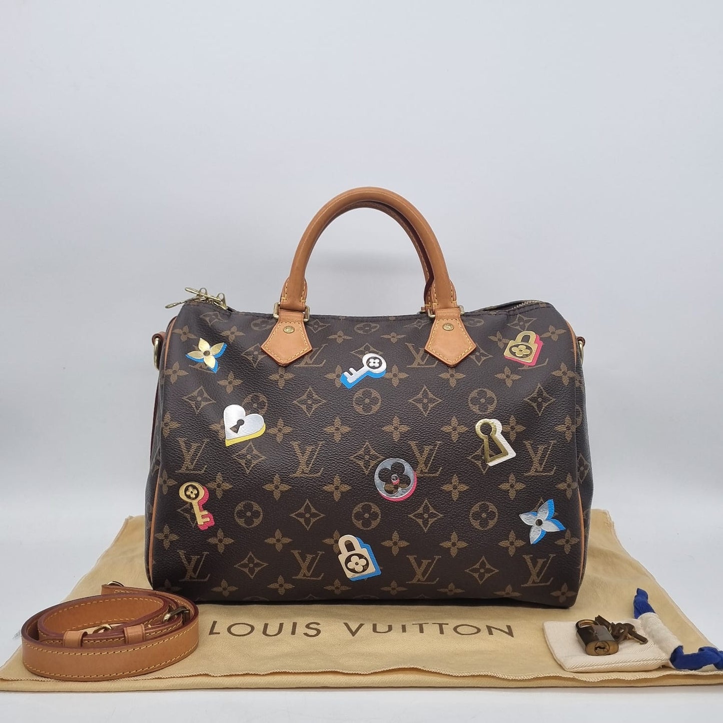 Louis Vuitton Speedy Bandouliere Lock Love Monogram 2019 Size 30x17x25